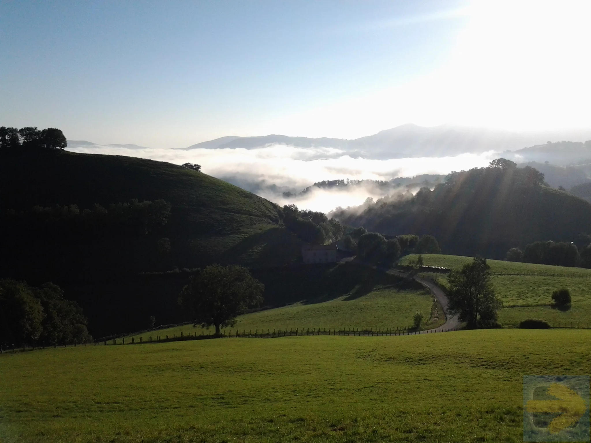 A long steep winding road into the hills from paradise